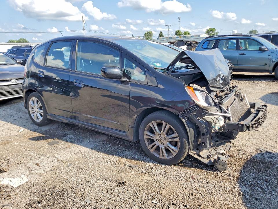 Photo 4 from auction – 2011 HONDA FIT with VIN JHMGE8H55BC026561