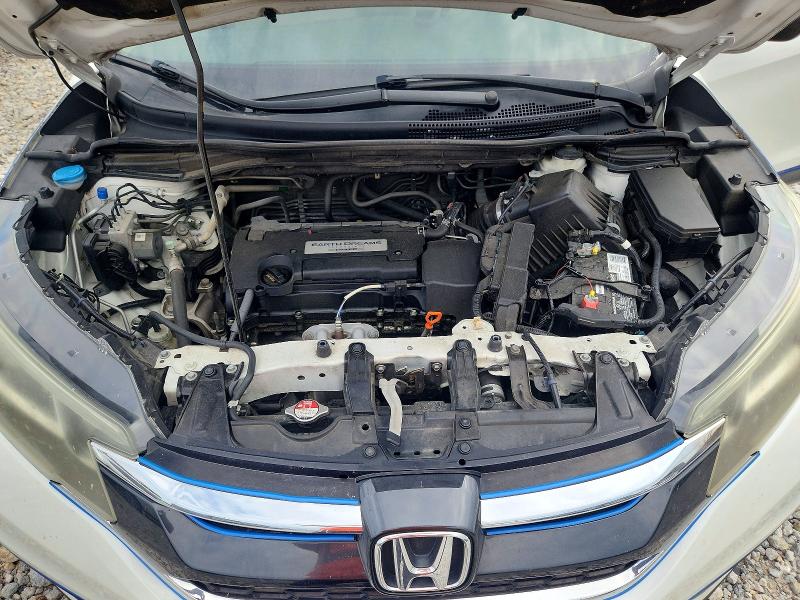 Photo 11 from auction – 2015 HONDA CR-V with VIN 5J6RM4H34FL123447