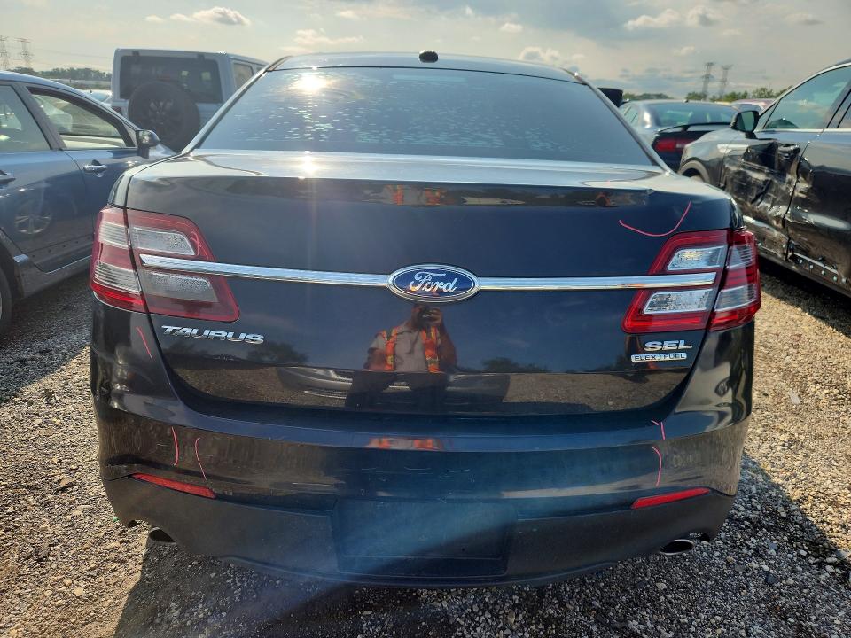 Photo 6 from auction – 2013 FORD TAURUS with VIN 1FAHP2E83DG222124
