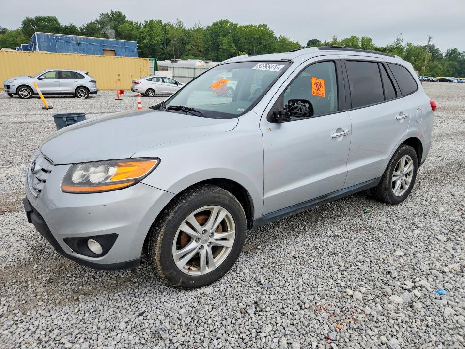 HYUNDAI SANTA FE 2010 with VIN 5NMSKDAG9AH397974 - Photo from auction