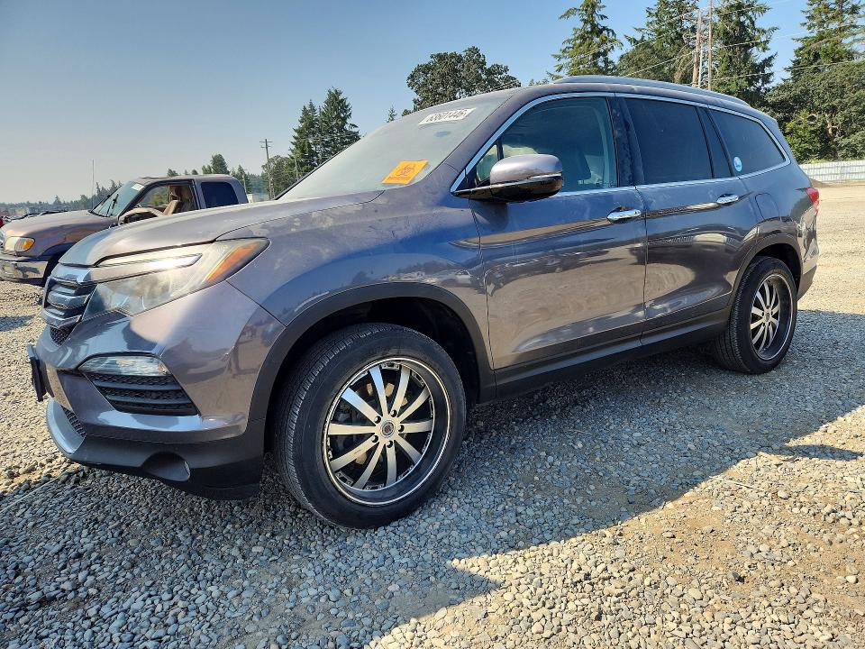 HONDA PILOT 2017 with VIN 5FNYF6H92HB034817 - Photo from auction