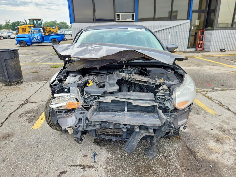 Снимка 5 от търг – 2014 FORD FOCUS с VIN 1FADP3K25EL317054