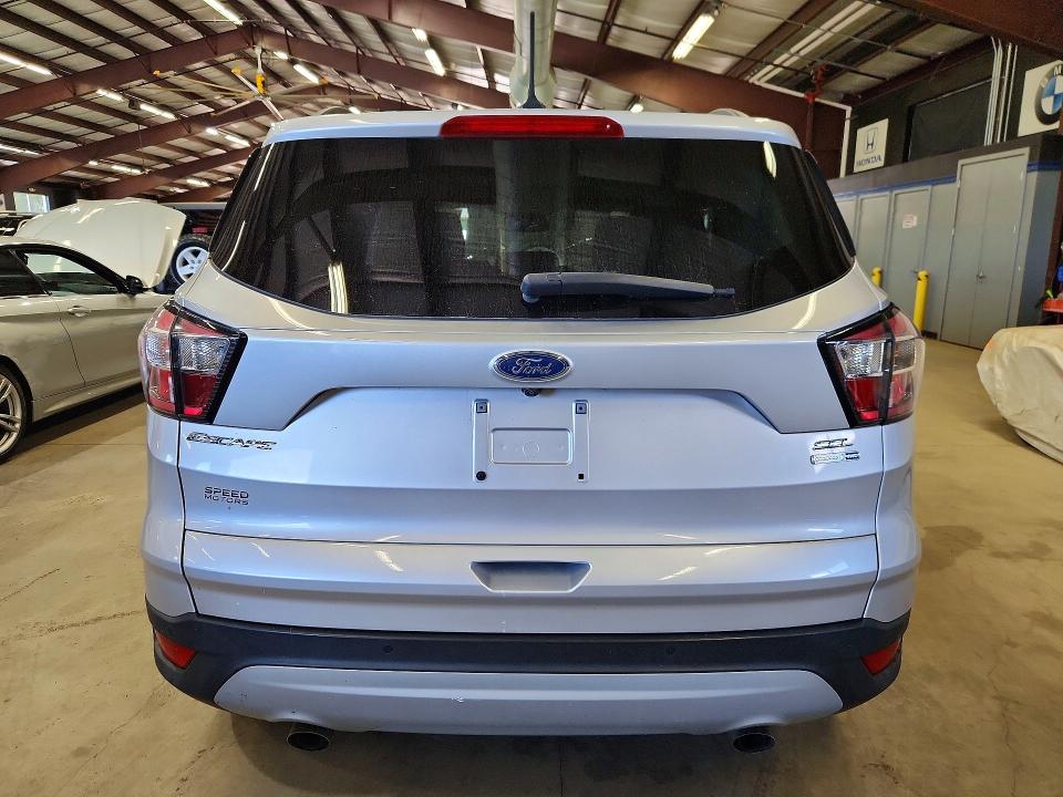 Photo 6 from auction – 2018 FORD ESCAPE with VIN 1FMCU9HD2JUB26704