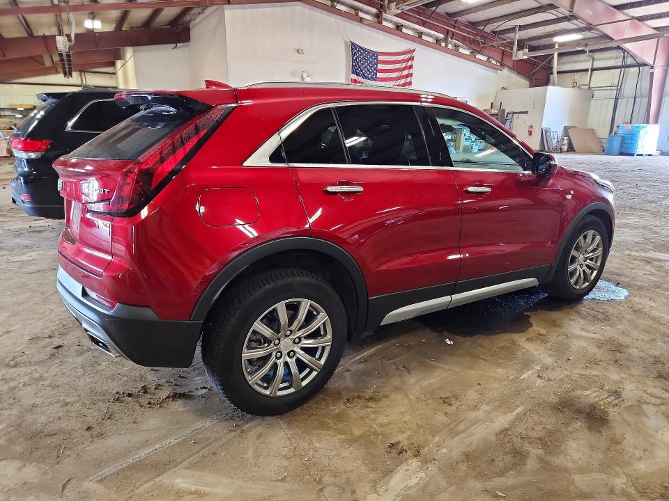 Photo 3 from auction – 2021 CADILLAC XT4 with VIN 1GYFZDR42MF035858