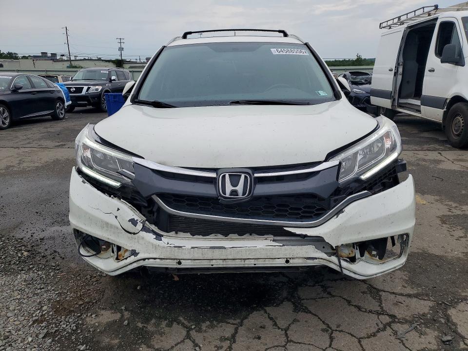 Photo 5 from auction – 2016 HONDA CR-V with VIN 5J6RM3H73GL018946