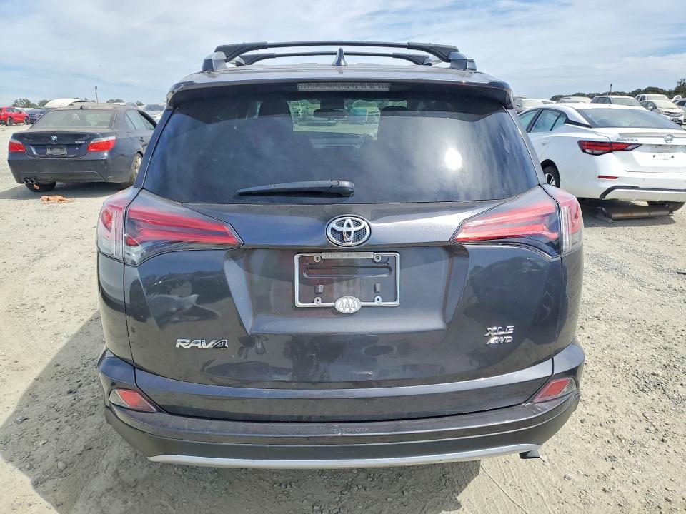 Photo 6 from auction – 2016 TOYOTA RAV4 with VIN 2T3RFREV1GW518171