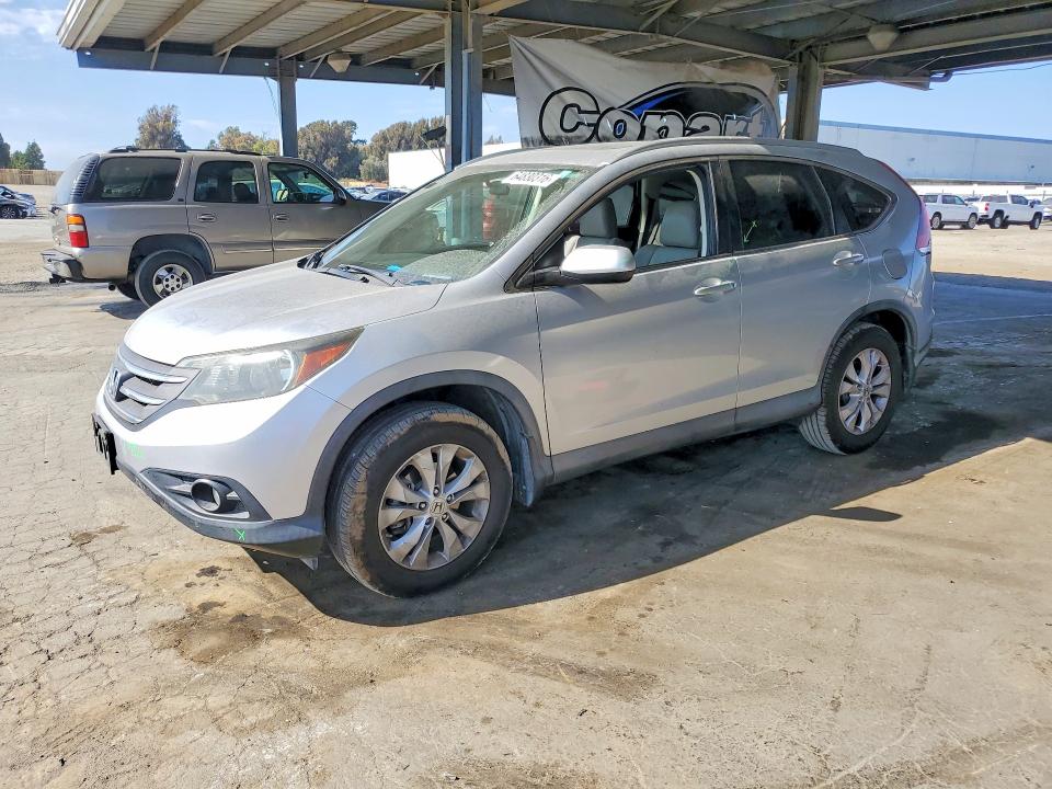 HONDA CR-V 2013 with VIN 2HKRM4H72DH678696 - Photo from auction
