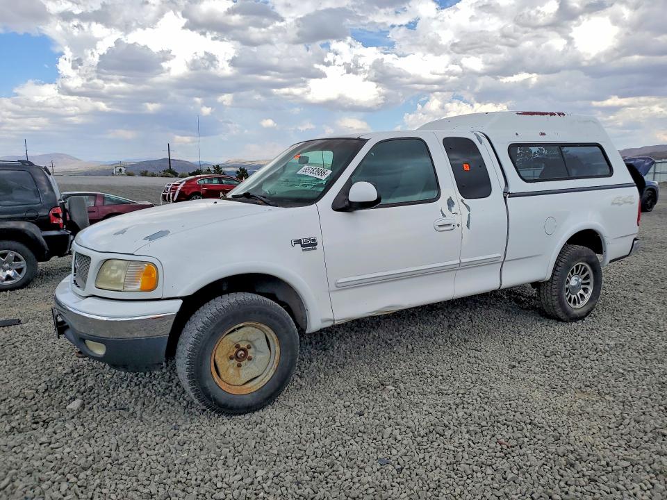 FORD F150 2000 with VIN 1FTRX18L5YKA37049 - Photo from auction