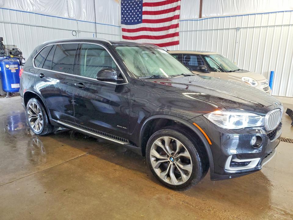 Foto 4 de la subasta – 2015 BMW X5 con VIN 5UXKR0C55F0P12467