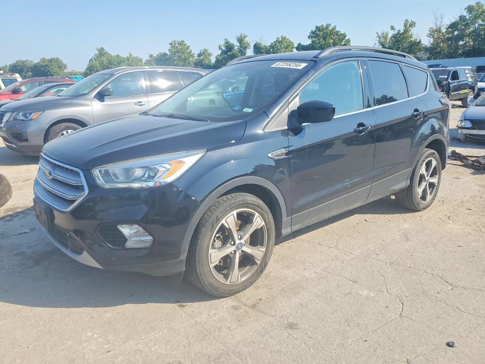 FORD ESCAPE 2018 with VIN 1FMCU9HD0JUA91418 - Photo from auction