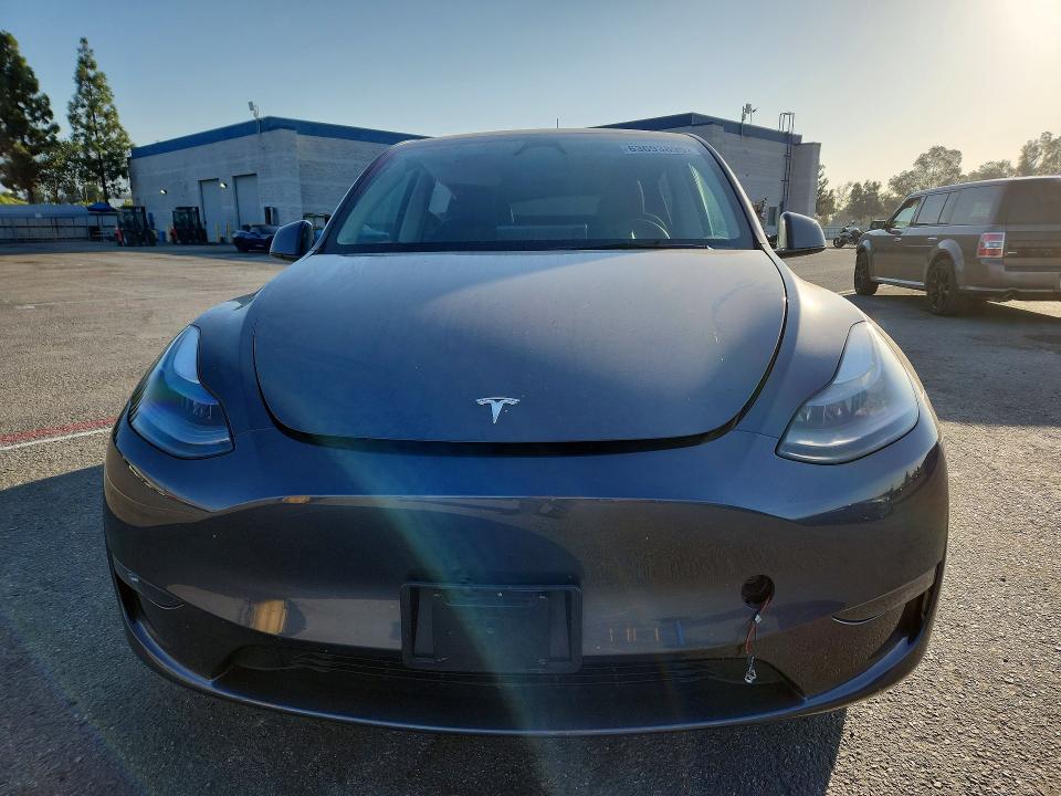 Photo 5 from auction – 2023 TESLA MODEL Y with VIN 7SAYGDEE6PF911250