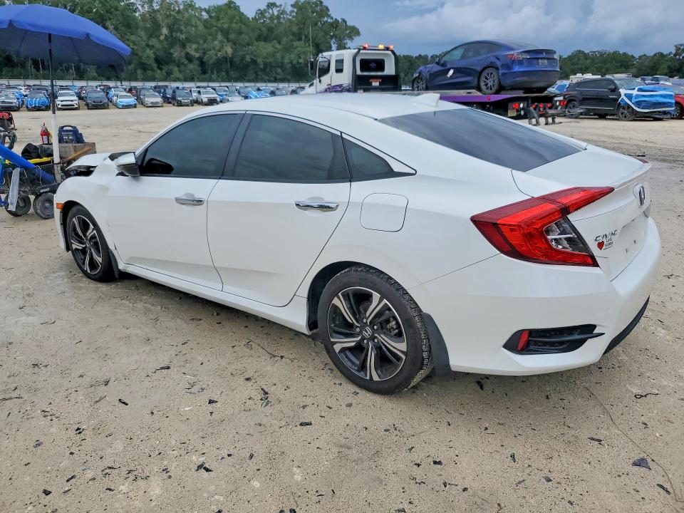 Photo 2 from auction – 2016 HONDA CIVIC with VIN 19XFC1F93GE034562