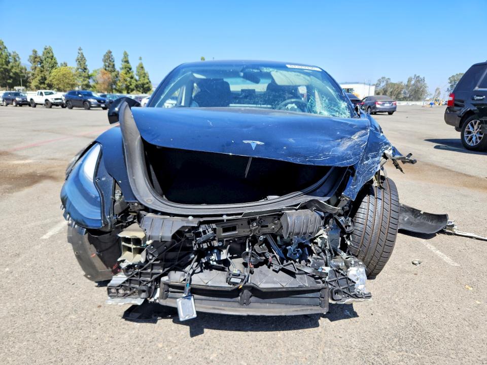 Photo 5 from auction – 2018 TESLA MODEL 3 with VIN 5YJ3E1EA2JF010098