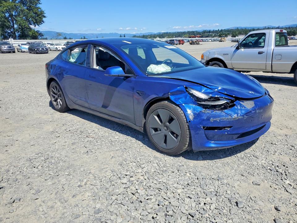 Photo 4 from auction – 2021 TESLA MODEL 3 with VIN 5YJ3E1EAXMF022858