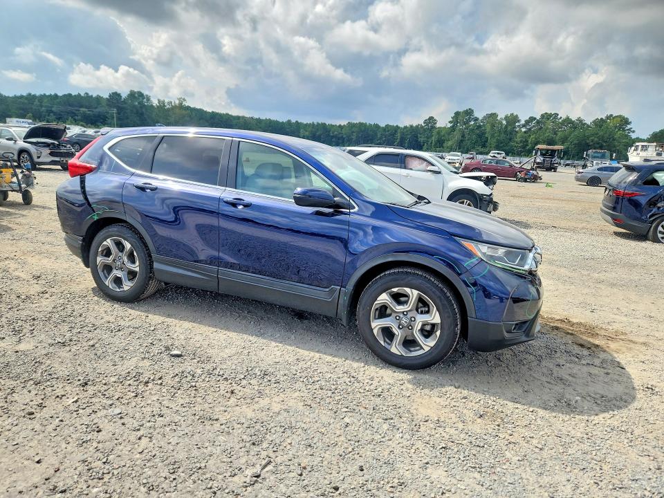 Photo 4 from auction – 2017 HONDA CR-V with VIN 2HKRW1H81HH503945
