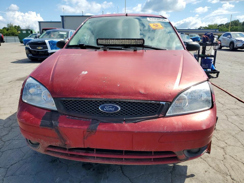 Photo 5 from auction – 2005 FORD FOCUS with VIN 3FAHP31N25R116274