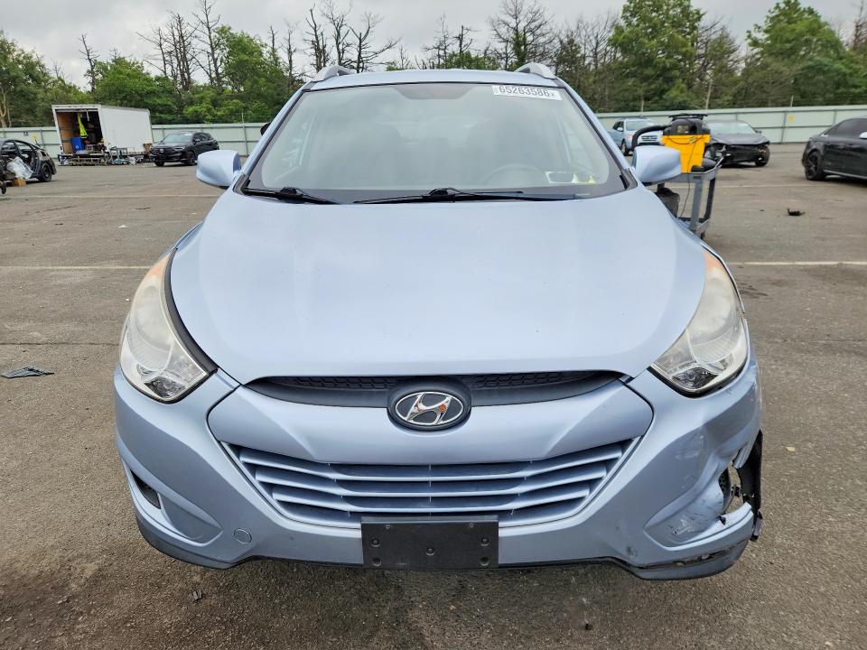 Photo 5 from auction – 2011 HYUNDAI TUCSON with VIN KM8JUCAC0BU200631