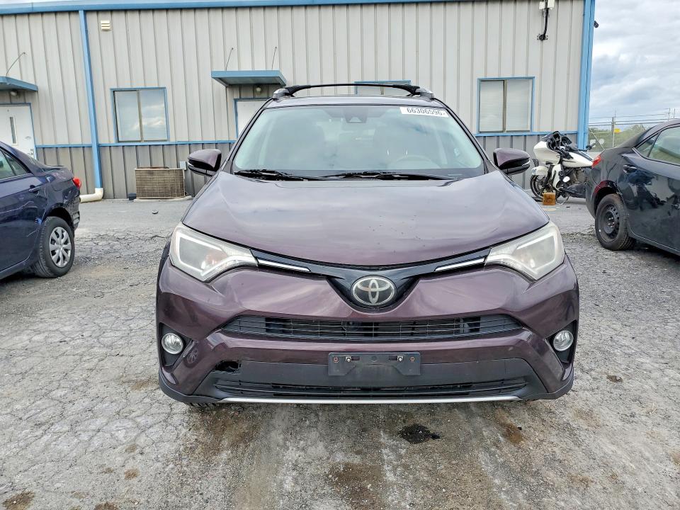 Photo 5 from auction – 2018 TOYOTA RAV4 with VIN 2T3RFREV9JW719954