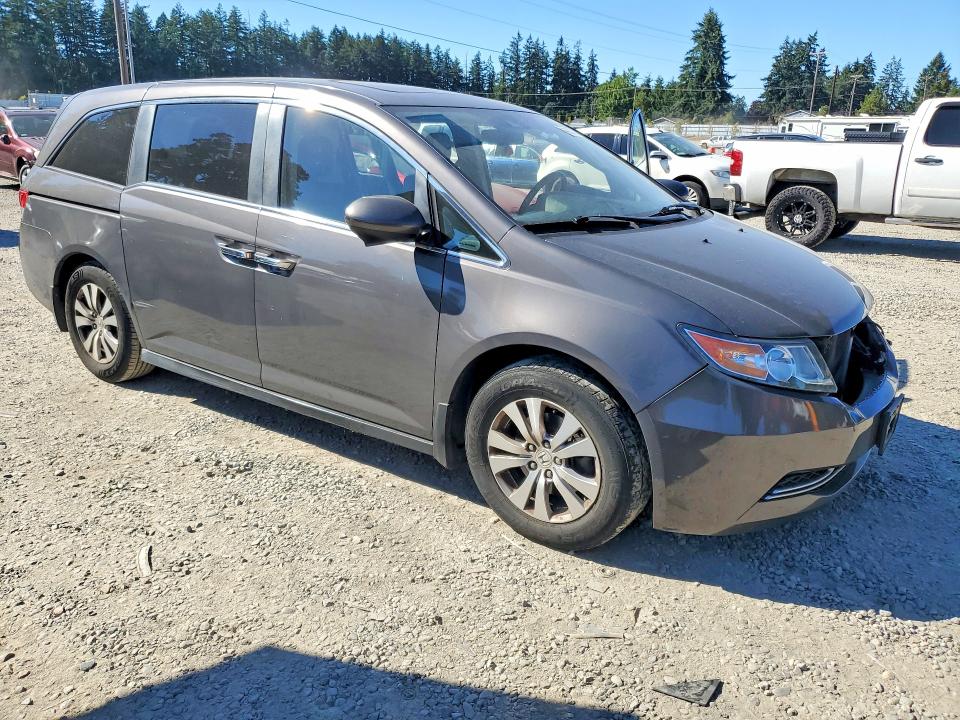 Photo 4 from auction – 2014 HONDA ODYSSEY with VIN 5FNRL5H6XEB012265