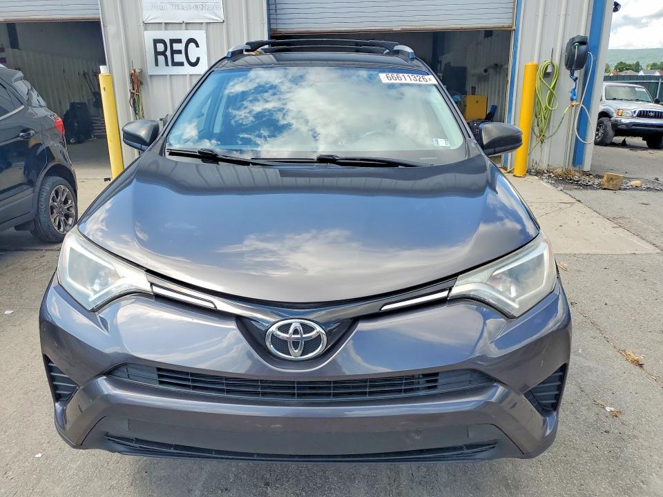 Photo 5 from auction – 2016 TOYOTA RAV4 with VIN JTMZFREV5GJ088045