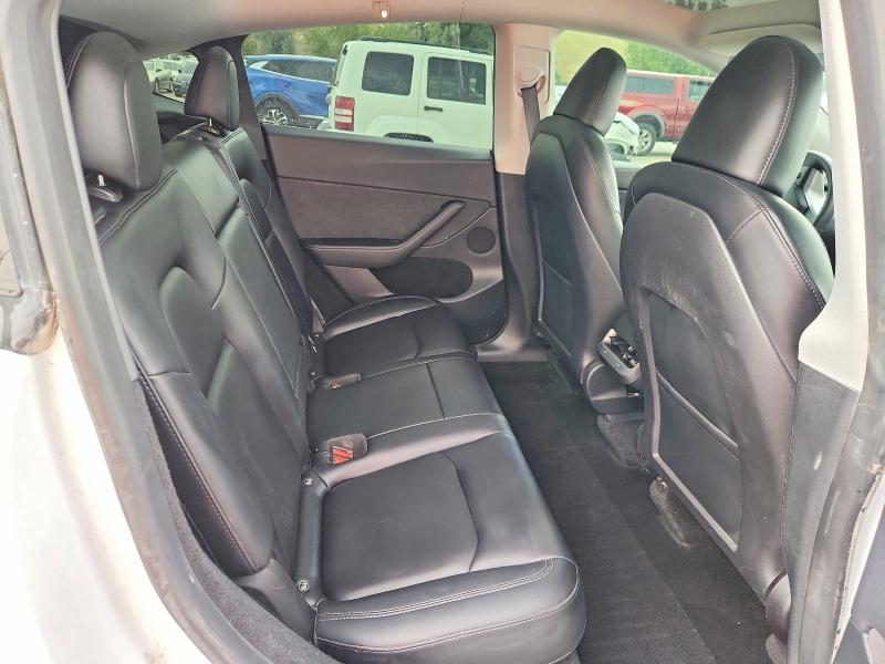 Photo 11 from auction – 2023 TESLA MODEL Y with VIN 7SAYGDEE0PF695282