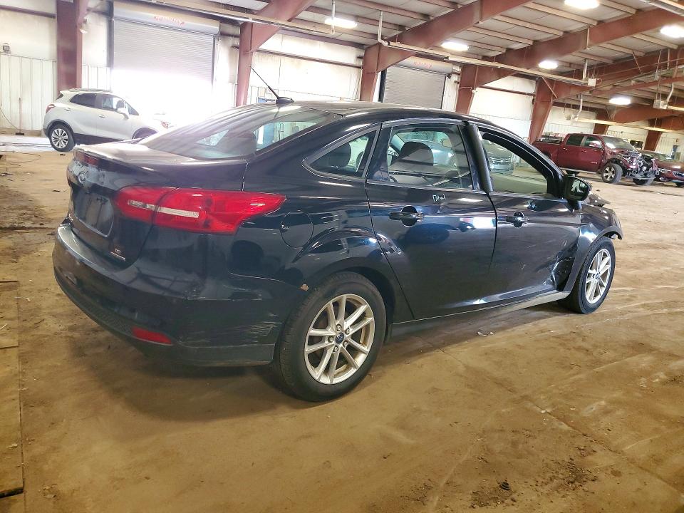 Photo 3 from auction – 2016 FORD FOCUS with VIN 1FADP3F21GL339176