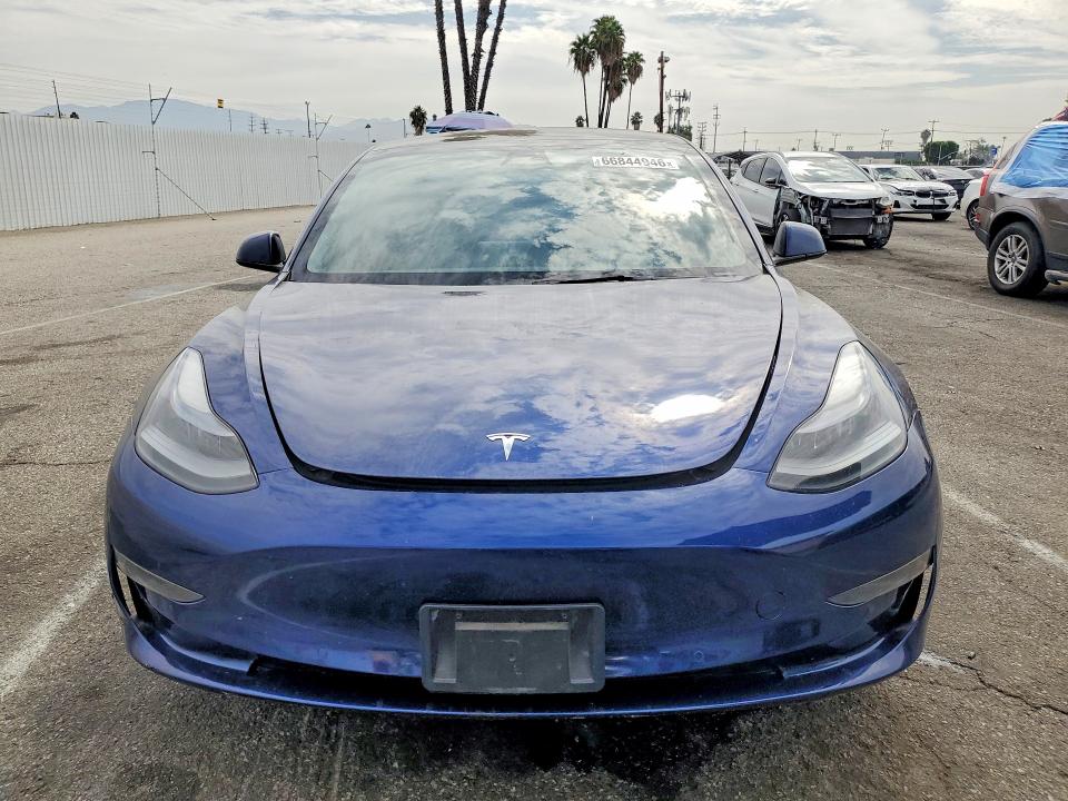 Photo 5 from auction – 2022 TESLA MODEL 3 with VIN 5YJ3E1EAXNF372721