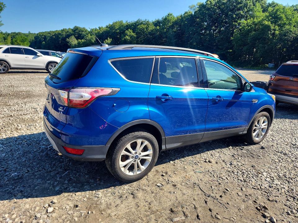 Photo 3 from auction – 2017 FORD ESCAPE with VIN 1FMCU9GD3HUA56450