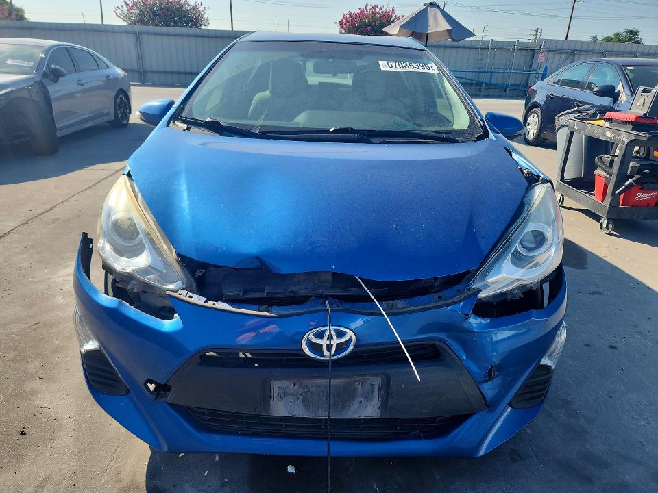 Photo 5 from auction – 2016 TOYOTA PRIUS C with VIN JTDKDTB33G1135113