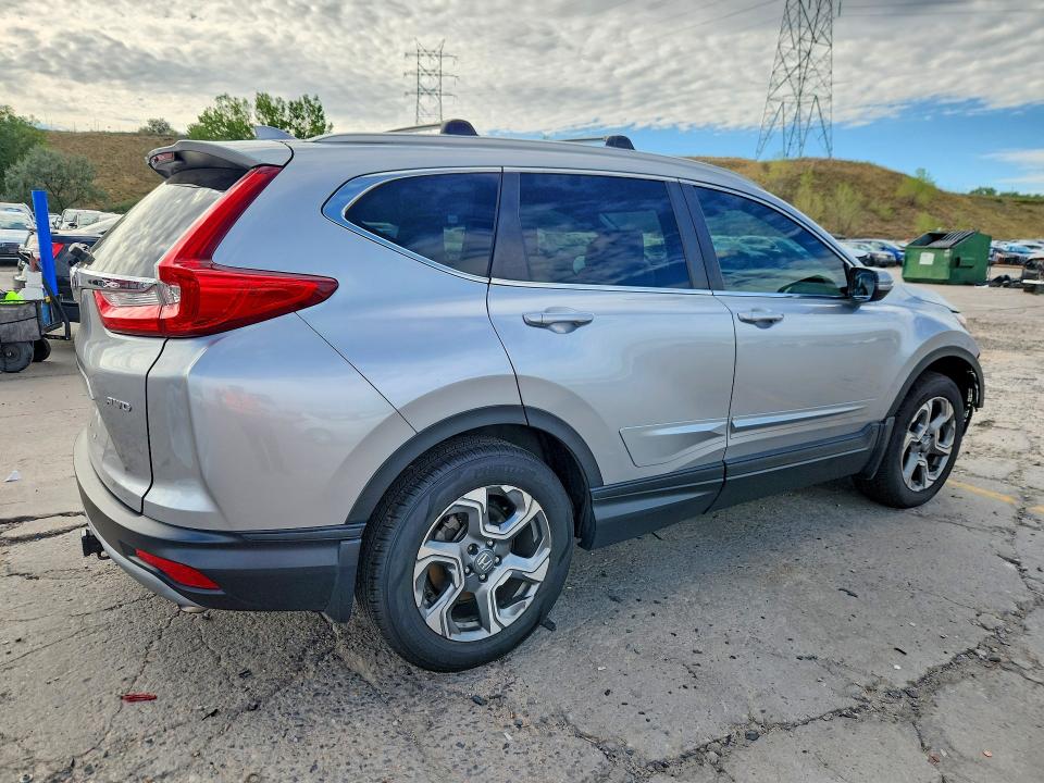 Photo 3 from auction – 2017 HONDA CR-V with VIN 2HKRW2H50HH631640