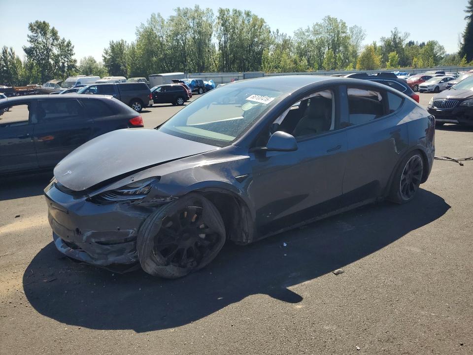 TESLA MODEL Y 2022 with VIN 7SAYGDEE2NF367861 - Photo from auction
