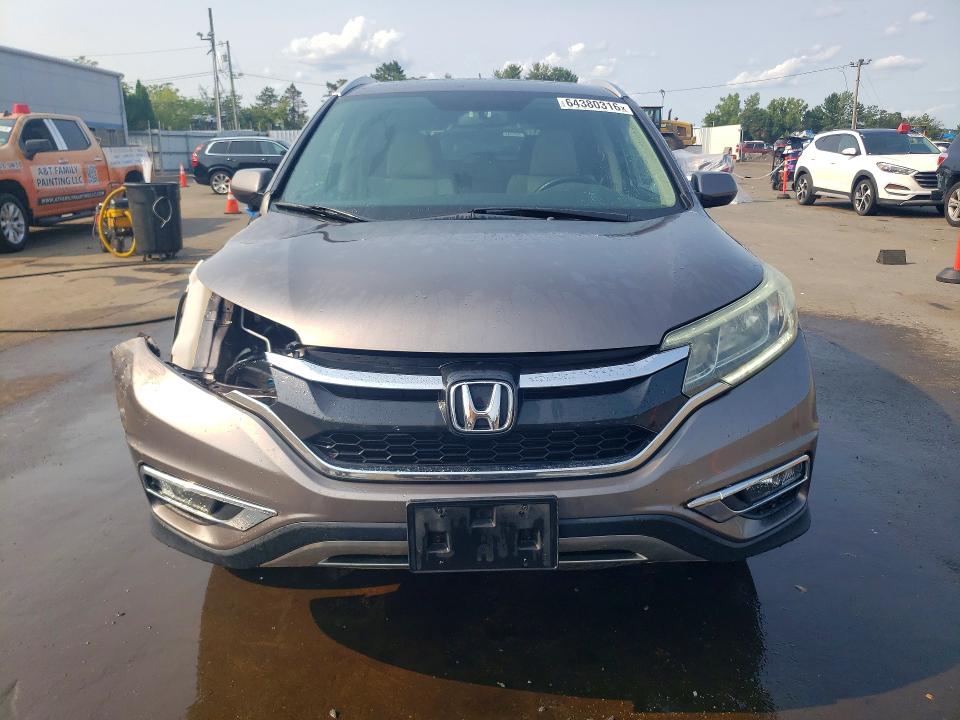 Photo 5 from auction – 2016 HONDA CR-V with VIN 5J6RM4H58GL020146