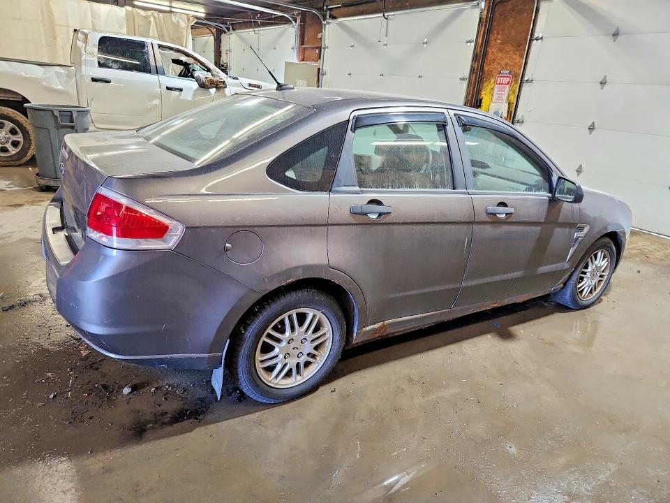 Photo 3 from auction – 2010 FORD FOCUS with VIN 1FAHP3FNXAW140810