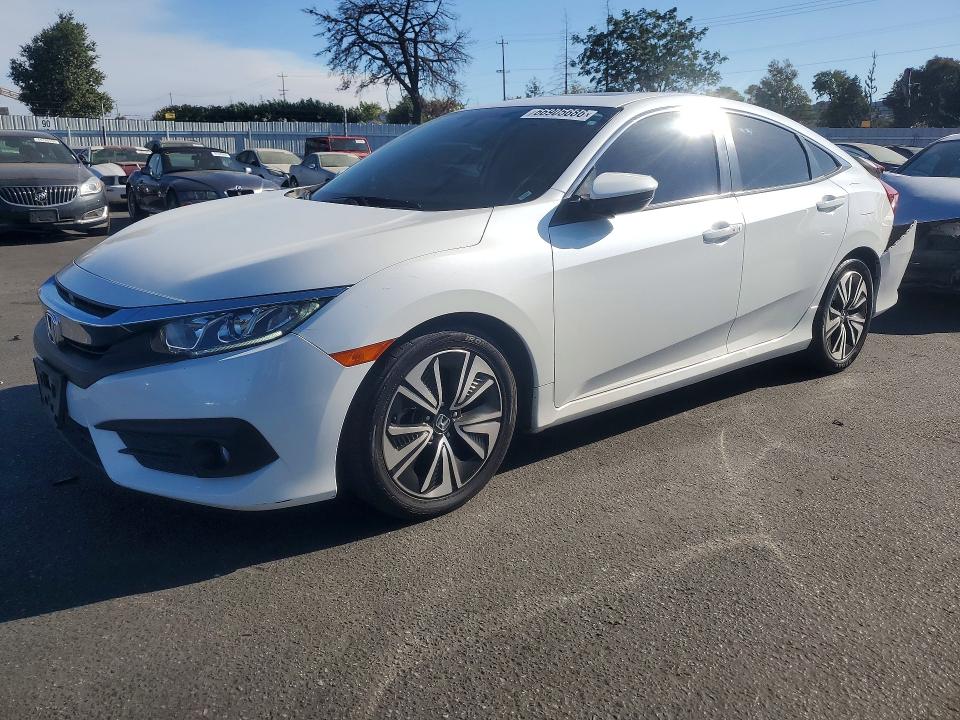 HONDA CIVIC 2018 with VIN JHMFC1F32JX037292 - Photo from auction
