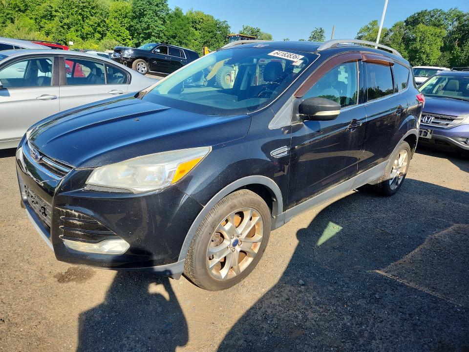 FORD ESCAPE 2014 with VIN 1FMCU9JX4EUC41301 - Photo from auction