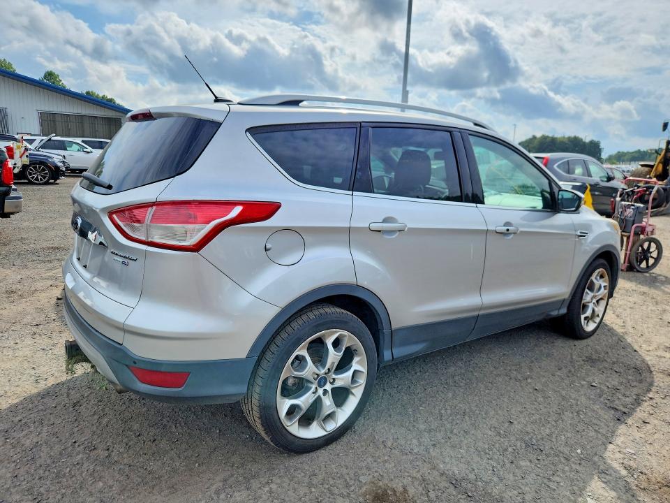 Photo 3 from auction – 2016 FORD ESCAPE with VIN 1FMCU9J98GUB90633