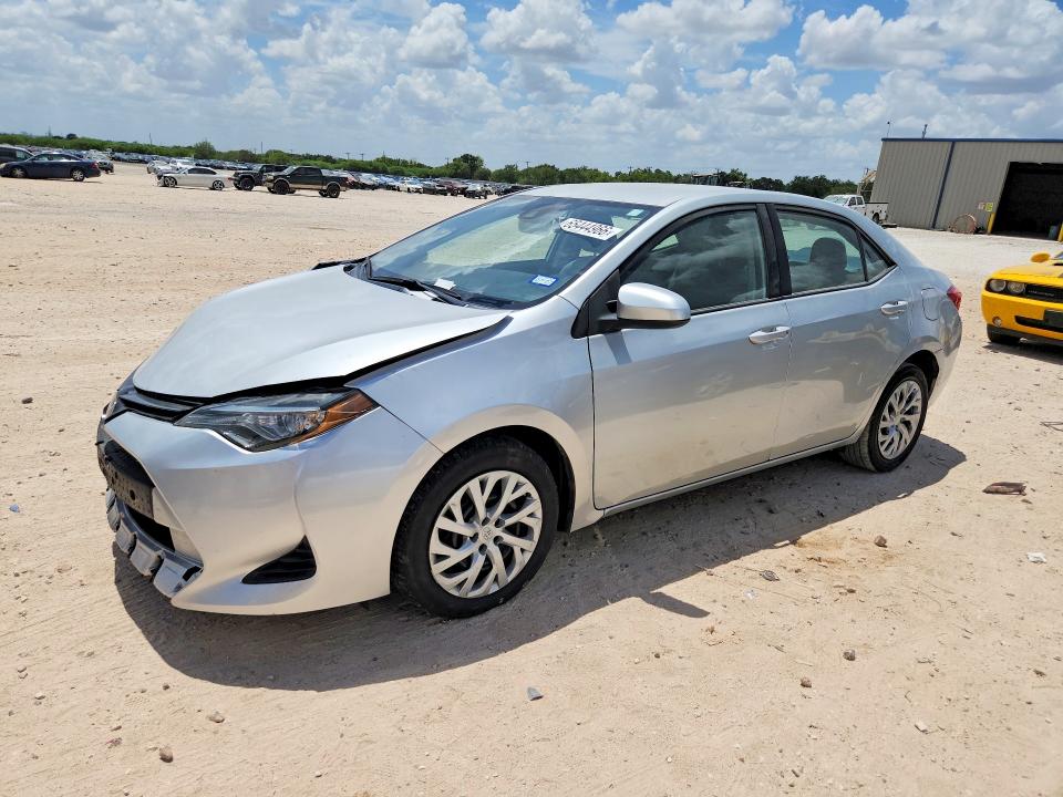 TOYOTA COROLLA 2019 with VIN 5YFBURHE0KP893703 - Photo from auction