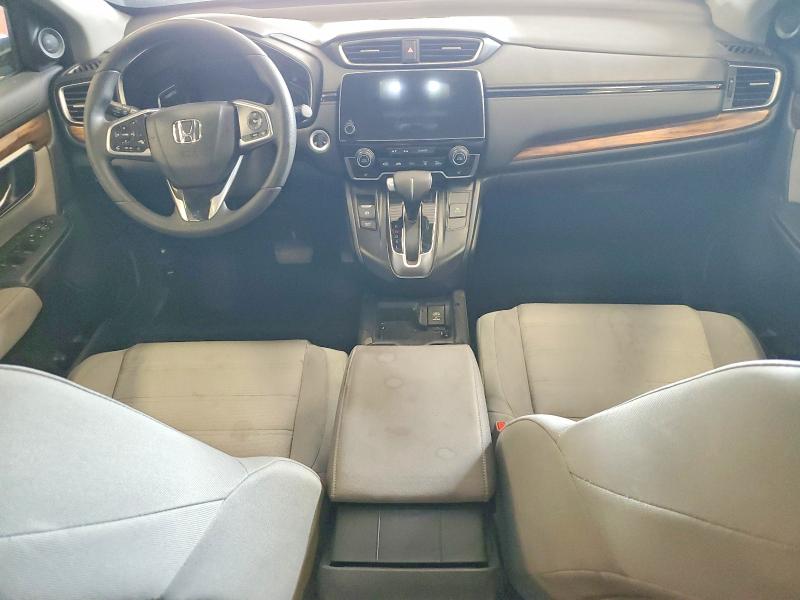 Photo 8 from auction – 2018 HONDA CR-V with VIN 7FARW2H55JE080582