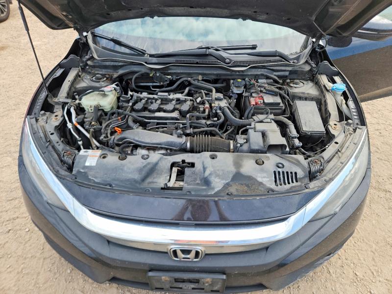Photo 11 from auction – 2018 HONDA CIVIC with VIN 2HGFC1F93JH101545