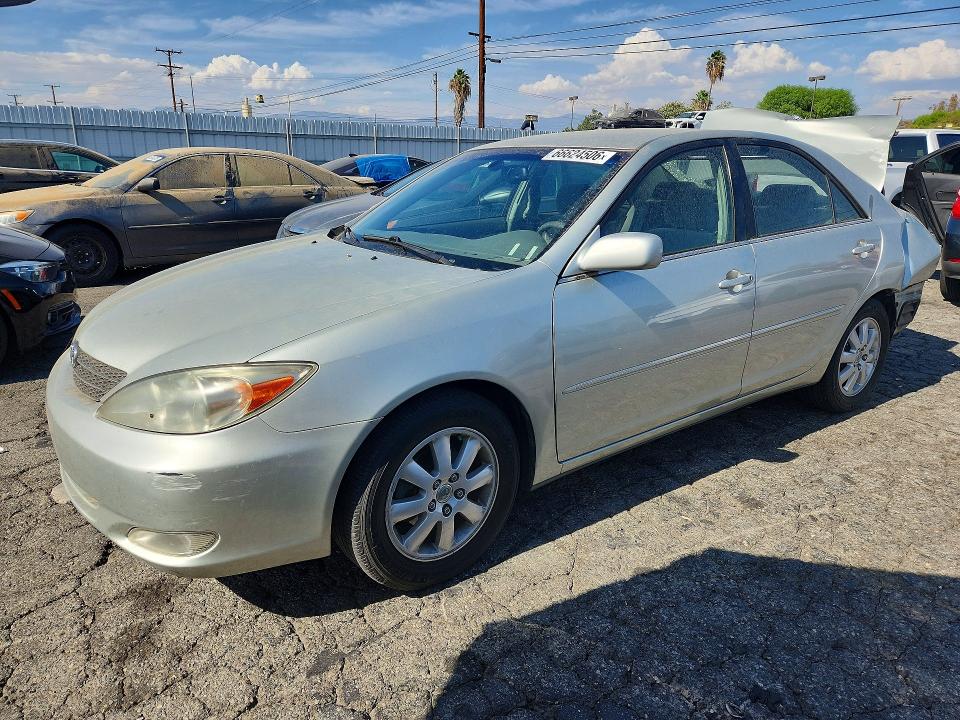 TOYOTA CAMRY 2003 with VIN JTDBE32K230171380 - Photo from auction