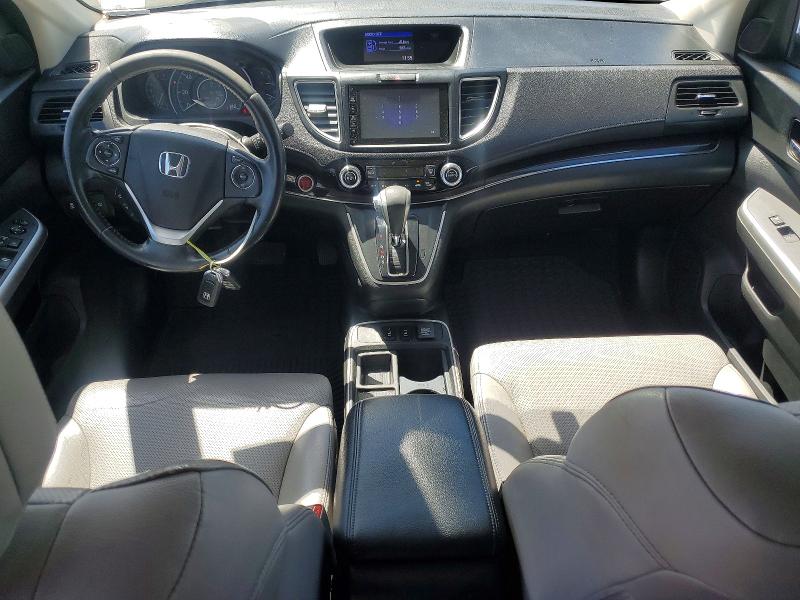 Photo 8 from auction – 2015 HONDA CR-V with VIN 2HKRM3H77FH503292