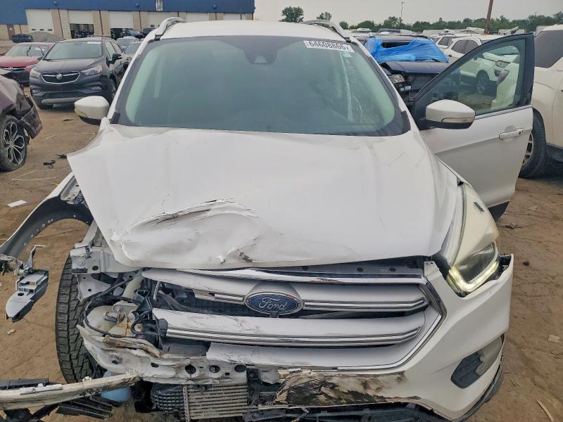 Photo 12 from auction – 2018 FORD ESCAPE with VIN 1FMCU9J97JUA00022