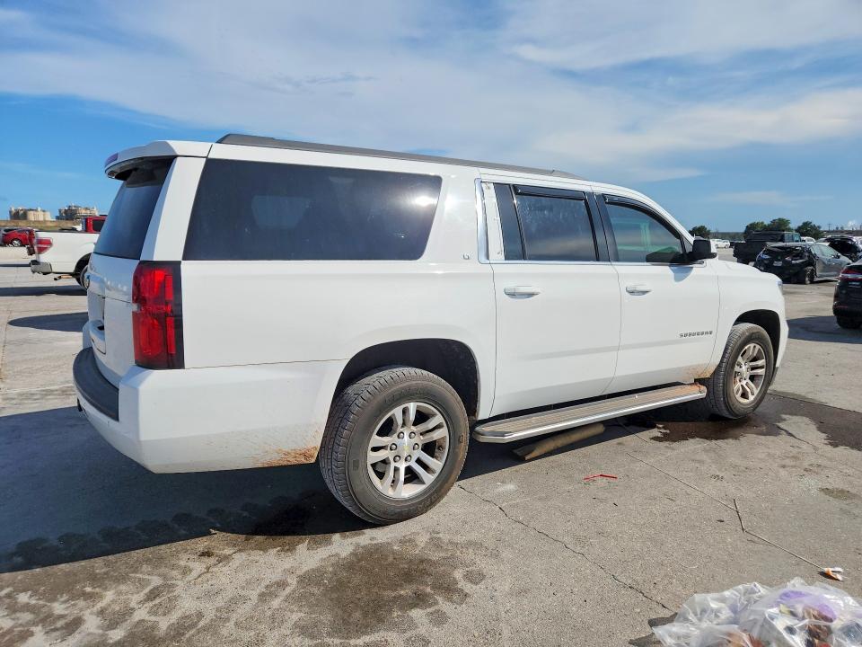 Photo 3 from auction – 2015 CHEVROLET SUBURBAN with VIN 1GNSCJKC8FR121819