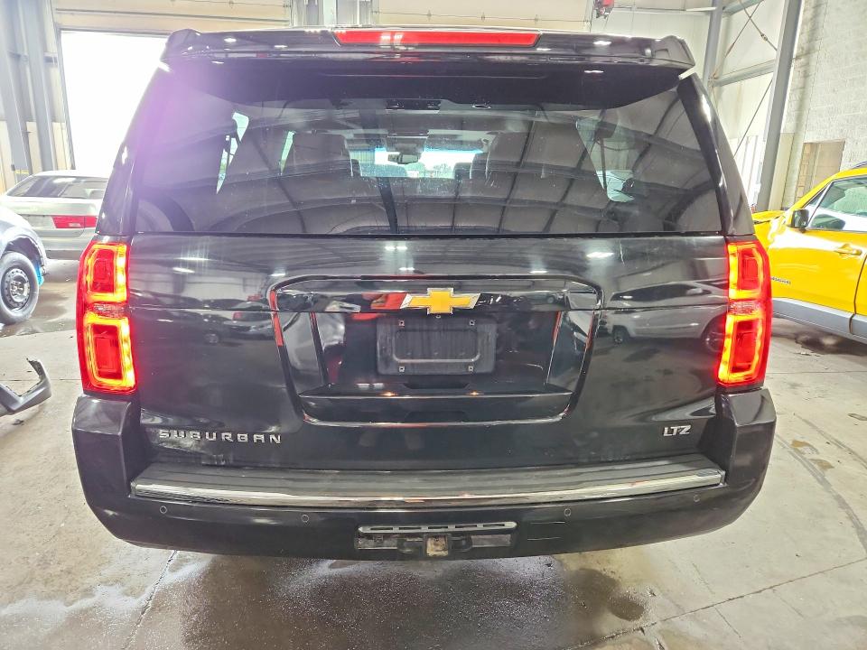 Photo 6 from auction – 2015 CHEVROLET SUBURBAN with VIN 1GNSKKKC9FR148665