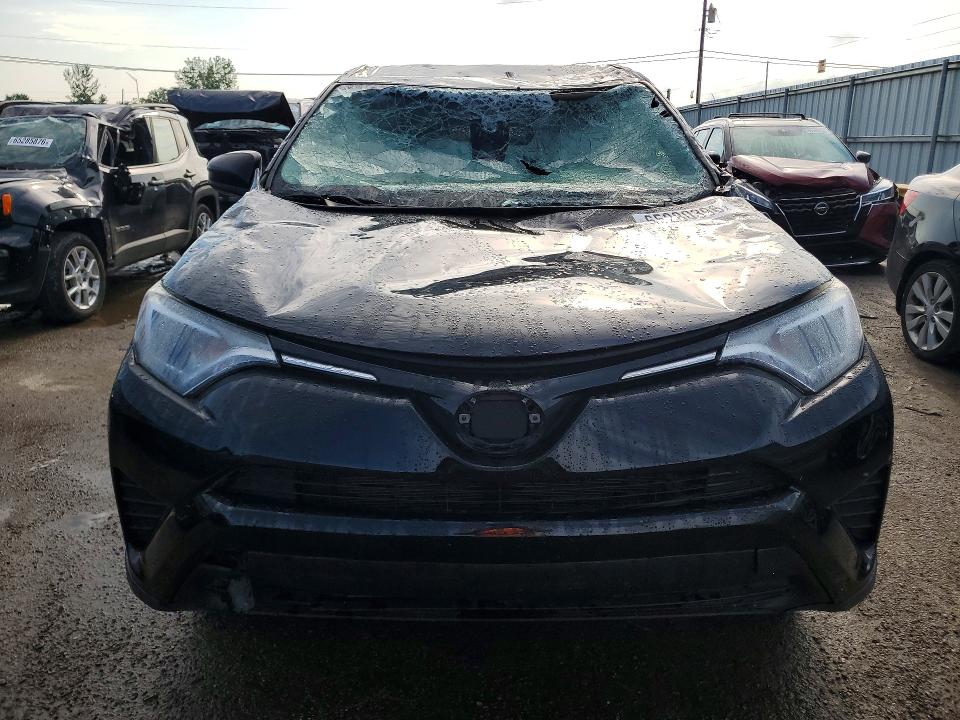 Photo 5 from auction – 2018 TOYOTA RAV4 with VIN 2T3BFREV8JW776941