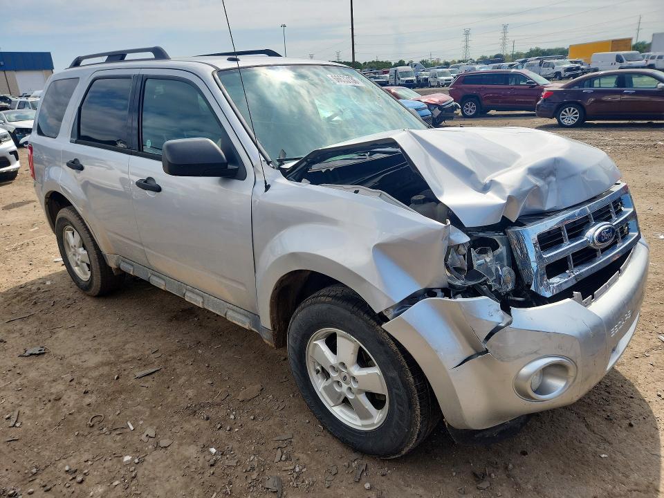 Photo 4 from auction – 2011 FORD ESCAPE with VIN 1FMCU0DGXBKB02546