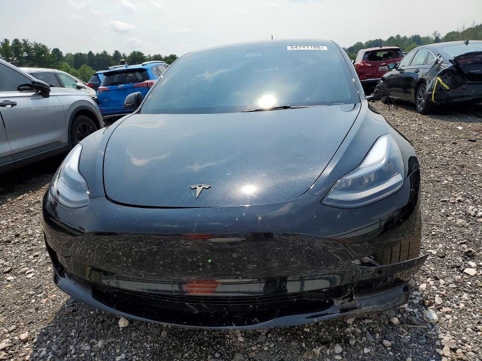 Photo 5 from auction – 2022 TESLA MODEL 3 with VIN 5YJ3E1ECXNF239443