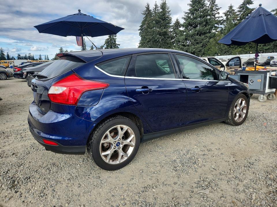 Photo 3 from auction – 2012 FORD FOCUS with VIN 1FAHP3M2XCL158723