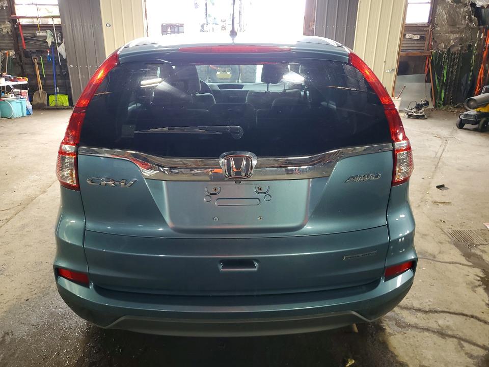 Photo 6 from auction – 2016 HONDA CR-V with VIN 5J6RM4H42GL070791