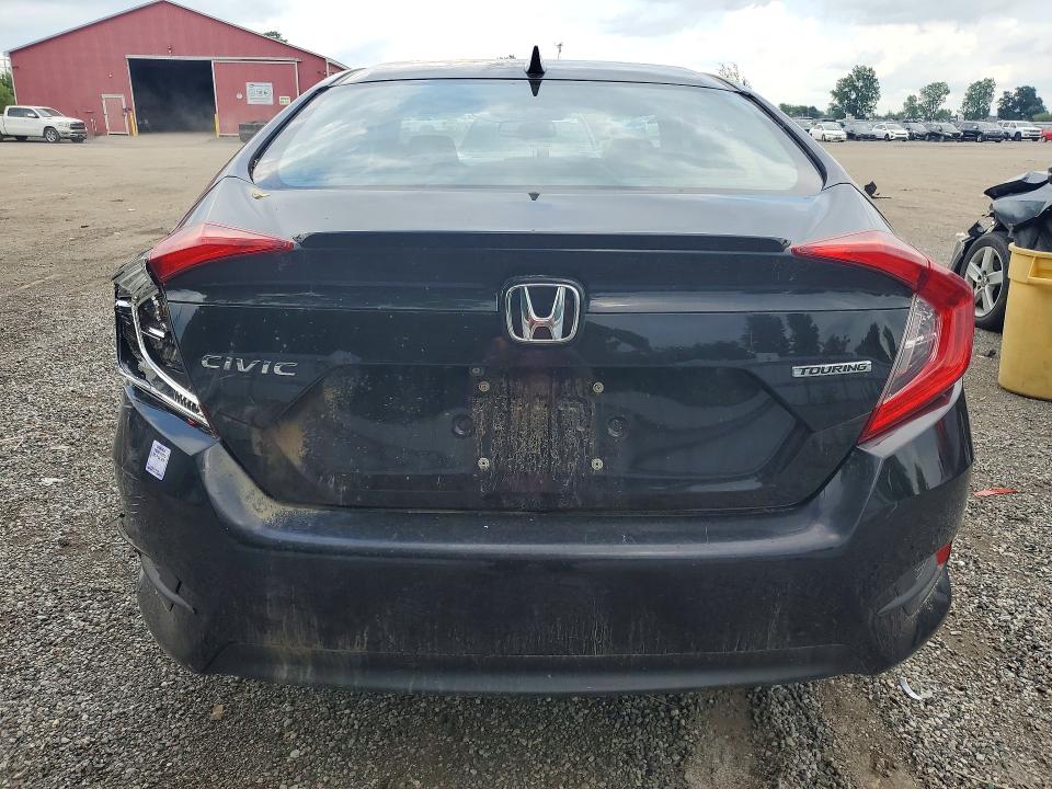 Photo 6 from auction – 2016 HONDA CIVIC with VIN 2HGFC1F95GH101135